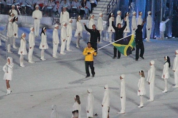 Errol Kerr carrying the Jamaican flag into BC Place at the Vancouver 2010 opening ceremony