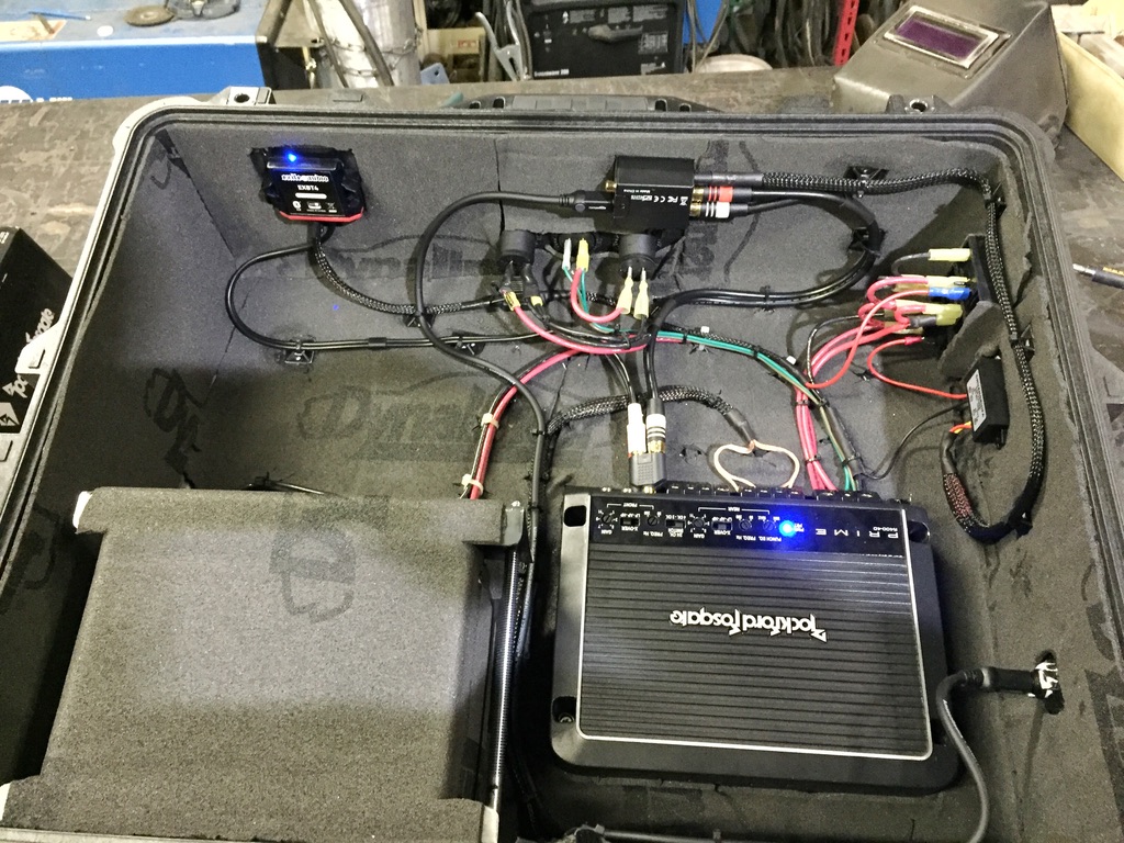 Tidied wiring with Bluetooth module installed showing blue power LED, amp ready