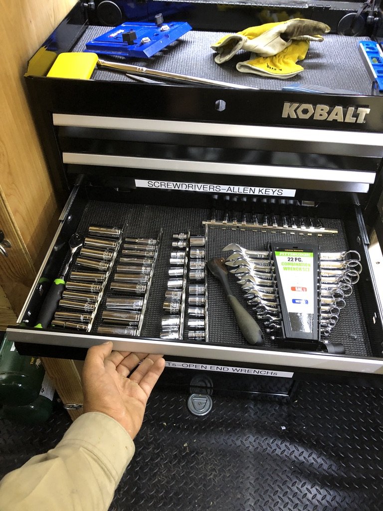 Kobalt drawers open showing the organized sockets and tools inside