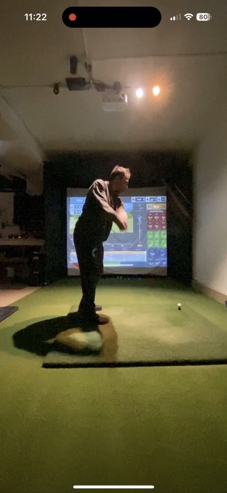V2 player swinging with stats grid