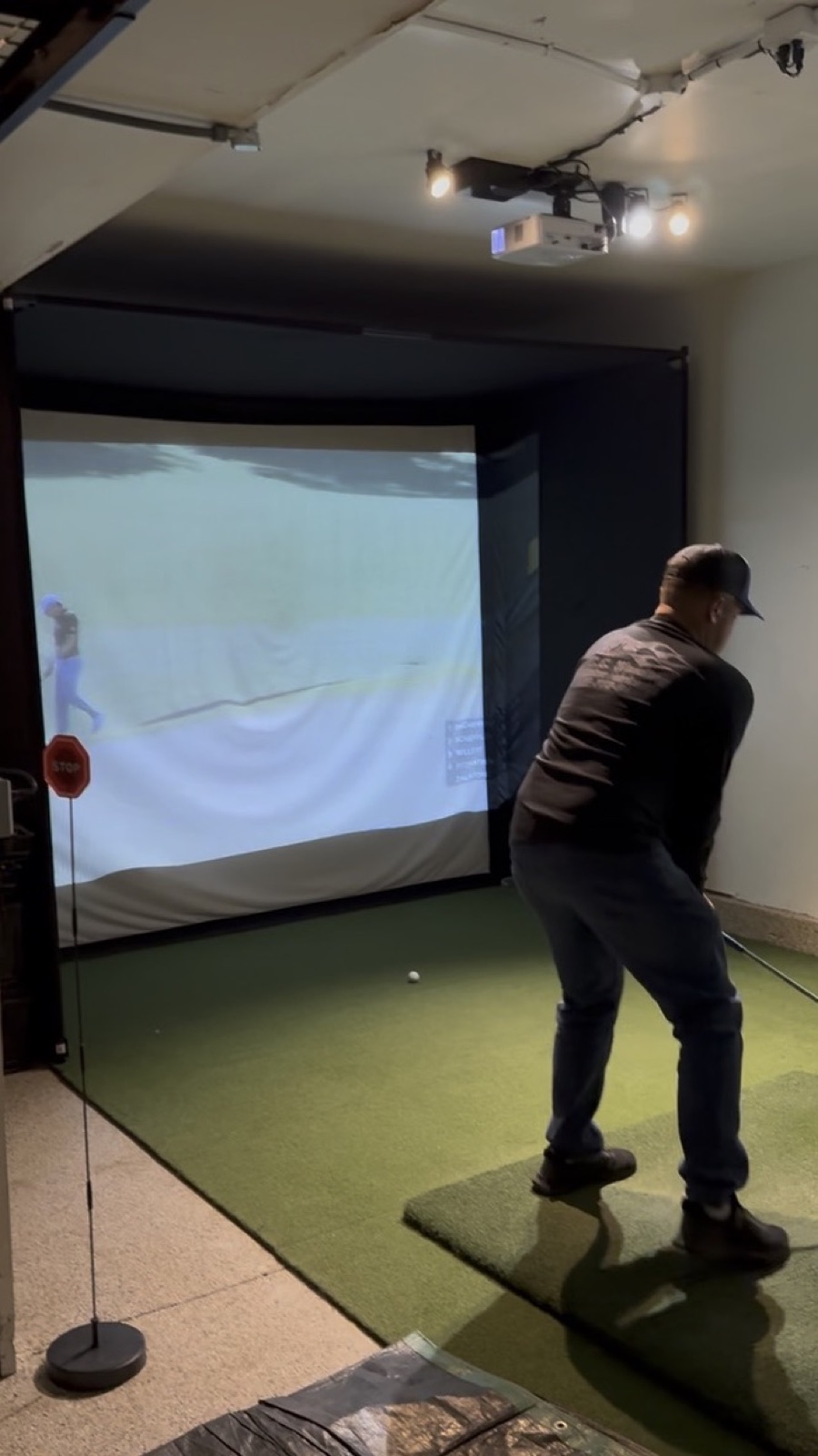 V2 player swinging at projection
