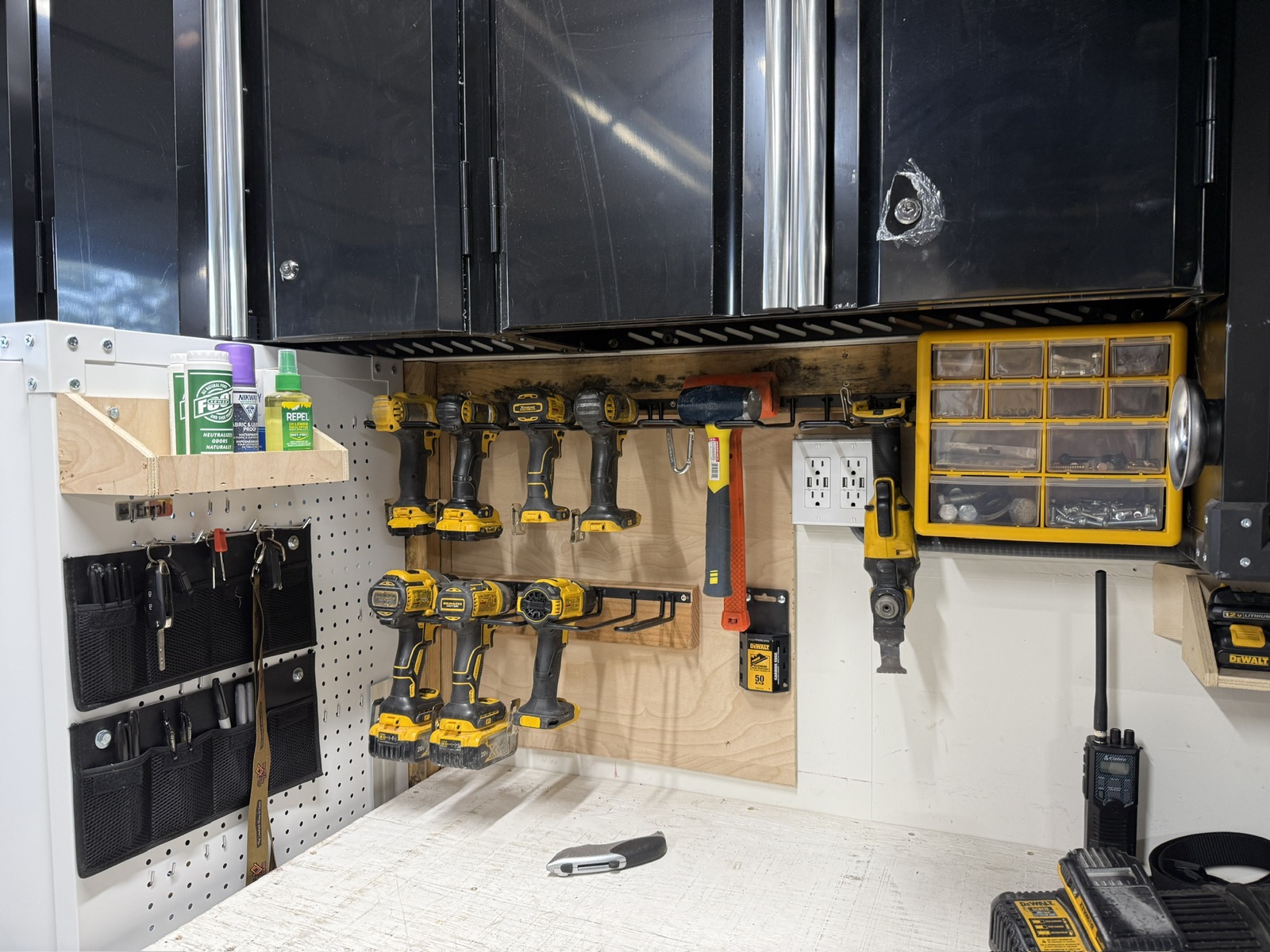 Workbench detail with hand tools laid out for organizing