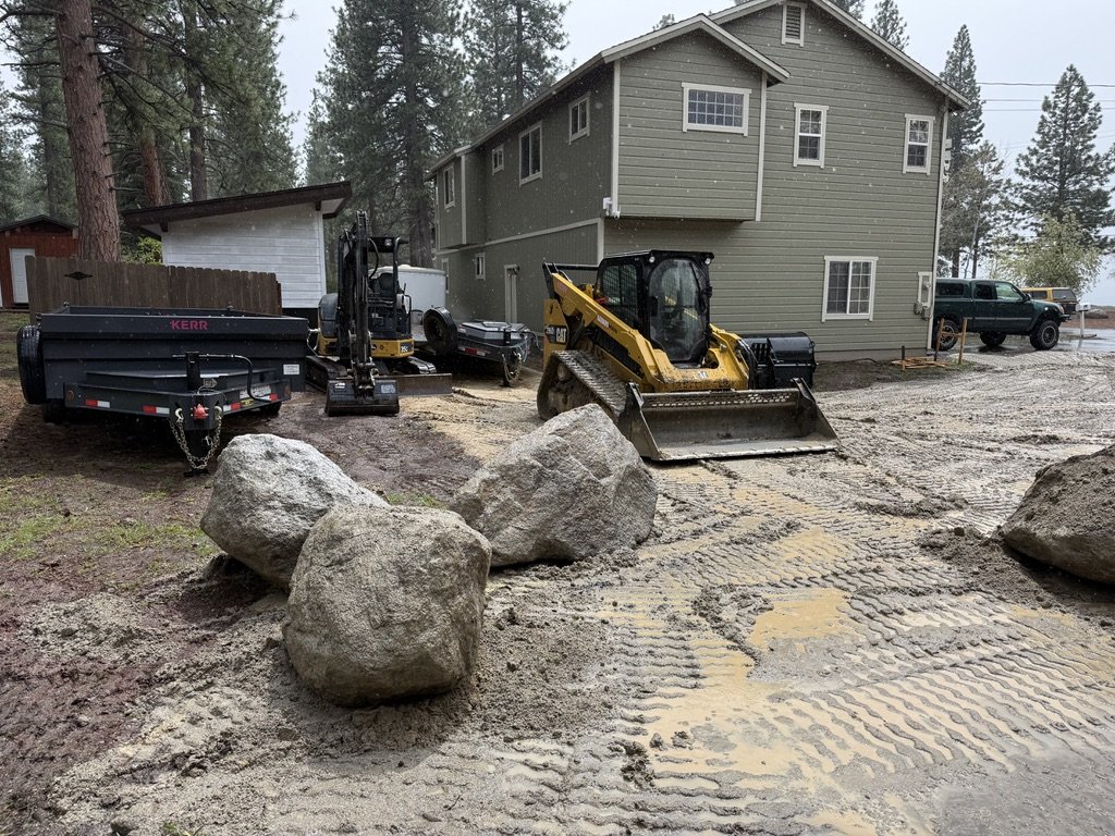 Subgrade ready, dump trailer staged for next load