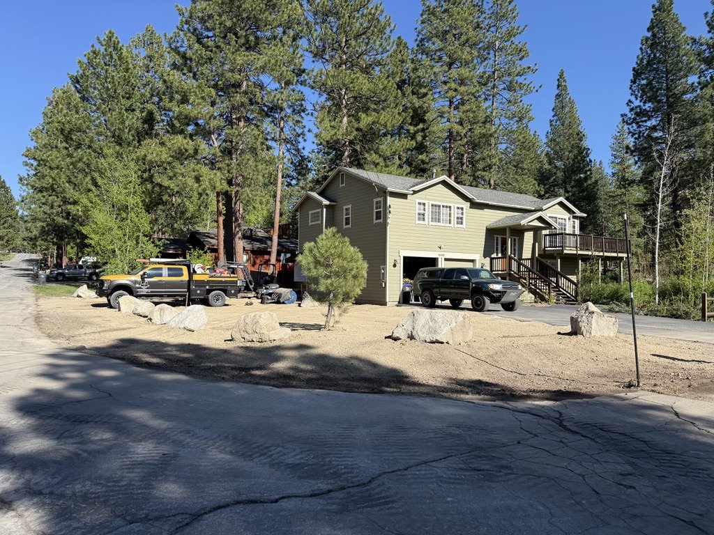 Boulders being arranged at the worksite