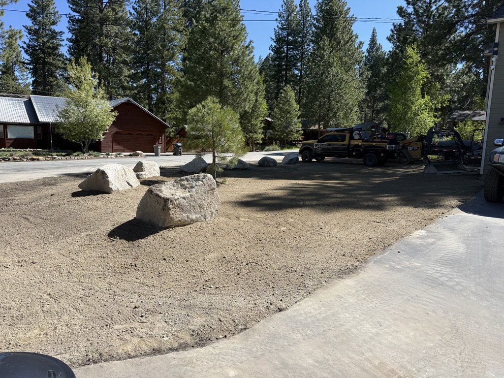 Grading work in progress, paths being cut between boulders