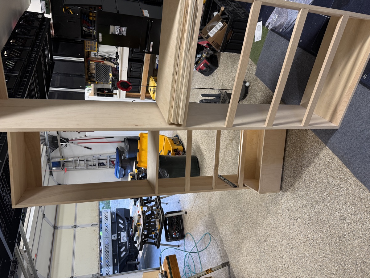 Shelving tower assembly with pocket-hole joinery