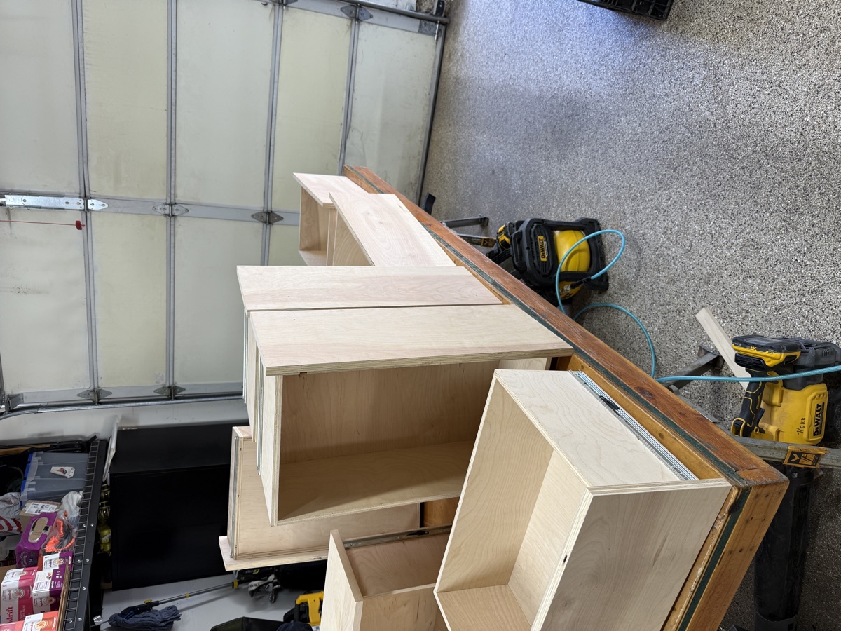 All shelving towers lined up in the garage