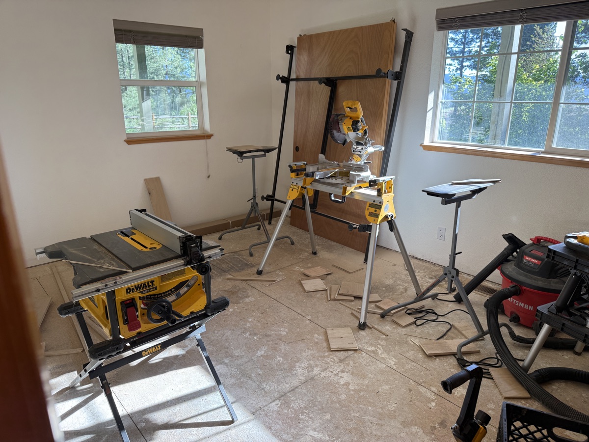 Miter saw and table saw cut station set up for hardwood floor installation