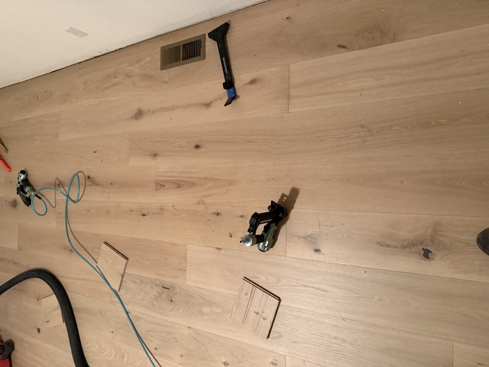 Close-up of white oak hardwood floor showing natural grain and knot character